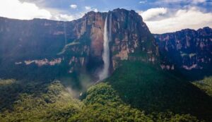 Angel Falls, also known as Salto Churn Mer, is a waterfall in the Guiana Highlands of Bolvar state, southern Venezuela, located on the Churn River, a tributary of the Caron, 160 miles (260 kilometres) southeast of Ciudad Bolvar